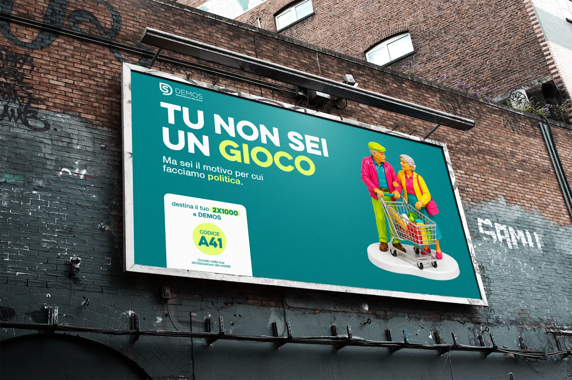 Affissione Tu non sei un gioco su un muro di mattoni