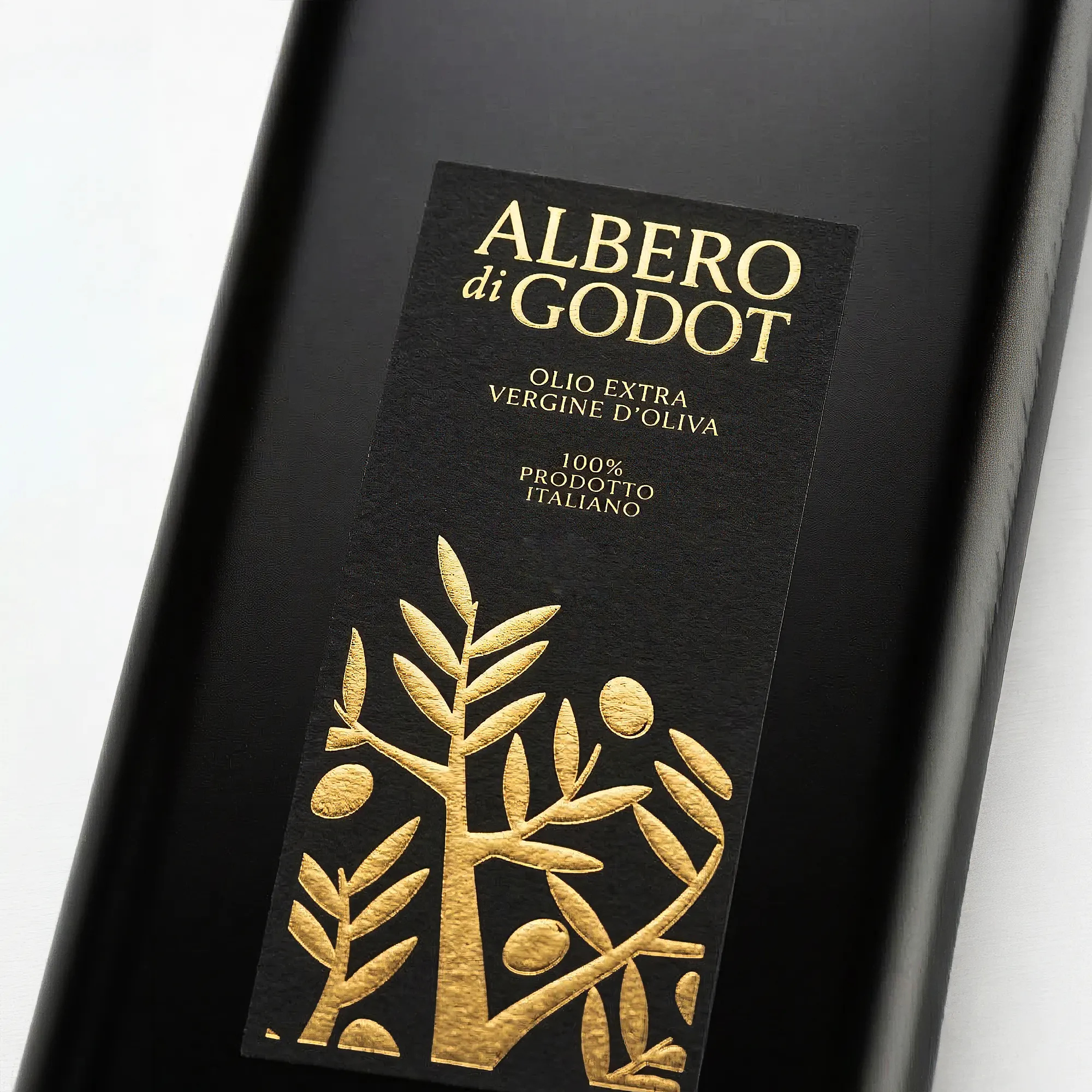 Dettaglio dell'etichetta oro di Albero di Godot